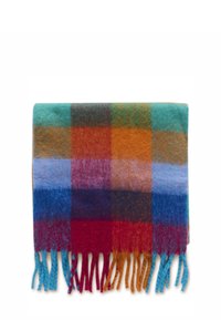 Daudzkrāsains kvadrātveida segas ar mīkstu tekstūru, kas satur laukumus zilā, zaļā, oranžā un sarkanā krāsā. Apstrādāta ar pušķainām malām.