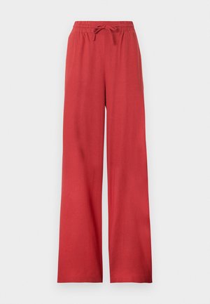 Pantaloni rossi a gamba larga con vita elasticizzata e coulisse, realizzati in tessuto morbido.