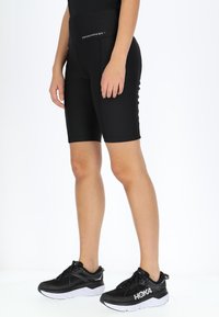 Swedemount GYM SHORTS TIGHTS W - Shorts - black