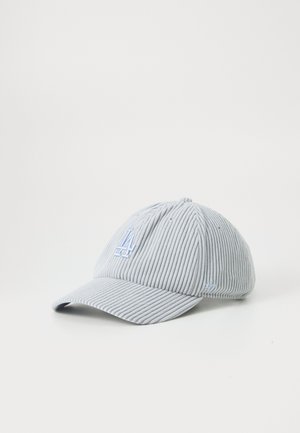 Light blue corduroy cap with a front logo, featuring a curved brim and structured design, set against a plain white background.