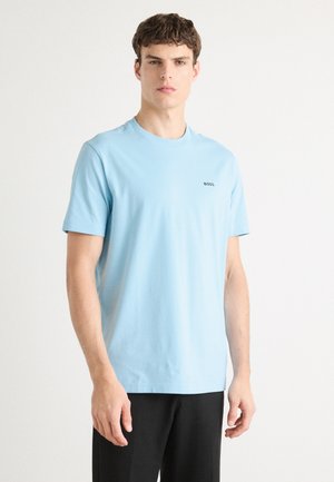 Light blue short-sleeve T-shirt made of soft cotton with a round neckline; features a subtle black "BOSS" logo on the left chest.