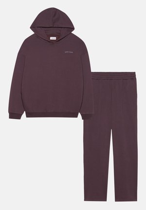 Dark purple hoodie with a front pocket and elastic cuffs, paired with matching pants featuring an elastic waistband and ribbed texture.