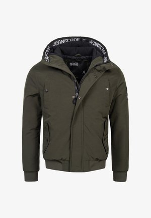 Oliivivihreä takki, joka on valmistettu teksturoidusta kankaasta ja jossa on vetoketjukiinnitys, napsuläpät sekä huppu, jossa on erottuva musta vuori.