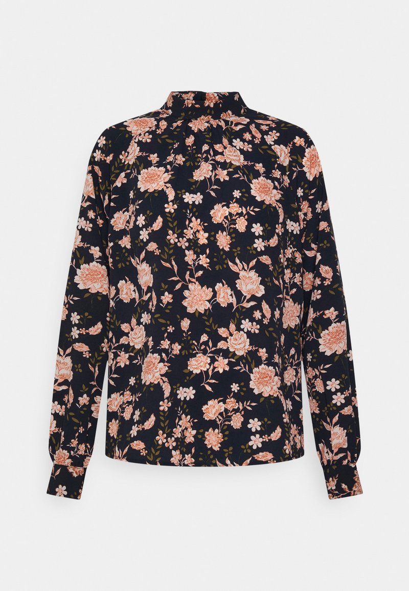 Camisa de mangas longas com padrão floral em azul-marinho, com flores rosas e brancas, apresentando um colarinho alto e punhos elásticos. Tecido macio.