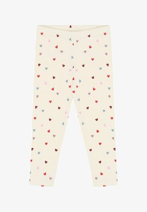 Crèmekleurige legging met verspreide kleine hartjes in rood, roze, blauw en bruin.