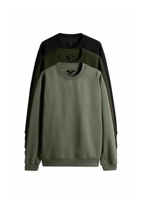 Tričko s okrúhlym výstrihom v troch farbách, usporiadané vertikálne. Farby sú tmavozelená, olivovo zelená a čierna. Vyrobené z hladkej, pevnej textílie s rebrovanými manžetami.