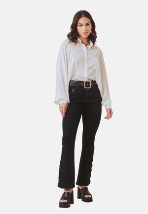 Vaqueros bootcut - black
