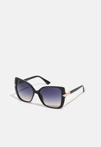 Ochelari de soare supradimensionați negri, cu lentile degrade, având o textură netedă și accente din metal auriu pe brațe. Design cu ramă pătrată.
