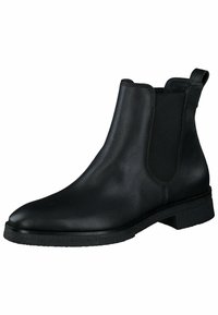 Botín Chelsea de piel negra con paneles laterales elásticos, puntera redonda y suela de goma texturizada. Cuenta con una agarradera en el talón para facilitar su colocación.