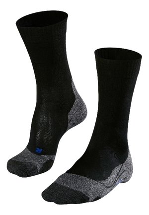 Calcetines deportivos negros con refuerzo en la parte del talón y los dedos de color gris, textura acanalada en la parte superior, con un acento de logo azul cerca del tobillo.