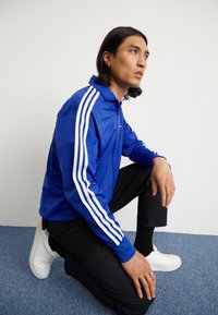 adidas Originals FBIRD - Φούτερ με φερμουάρ - semi lucid blue