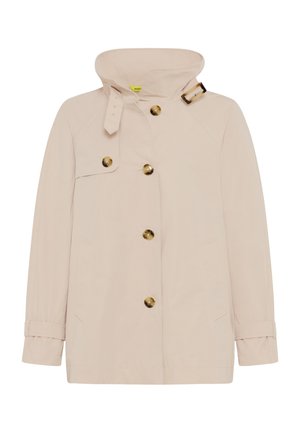 Beige mid-length jacket with high collar, tortoiseshell buttons down front and on chest flap, and buckle strap at collar.