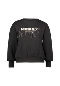 Czarny sweter z luźnym krojem, z błyszczącym napisem "MERRY" i ozdobiony czarnymi kokardkami jako akcentami. Długie rękawy i ściągacz na dole.