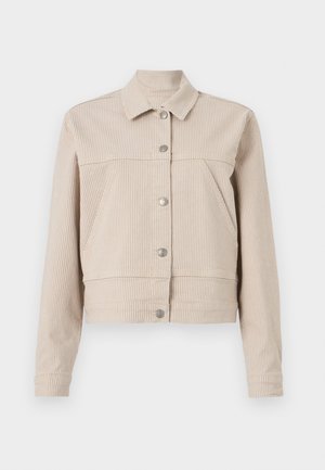 Chaqueta de pana beige con rayas verticales, cuello, cierre de botón en la parte frontal y dos bolsillos laterales. Corte cropped y mangas largas.