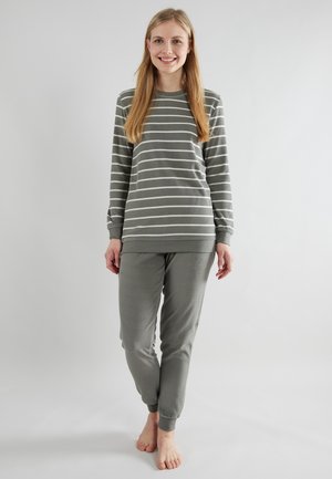 Grey pajama set featuring a long-sleeve top with white stripes and matching tapered pants. Soft fabric, ribbed cuffs, and a relaxed fit.