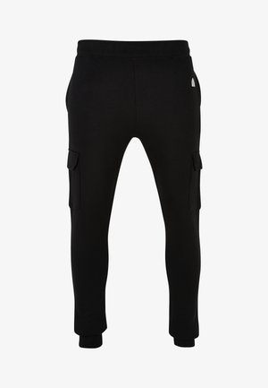 Zwarte sweatpants met eenkoordsluiting, zij cargozakken en elastische boorden, gemaakt van zachte, rekbare stof.