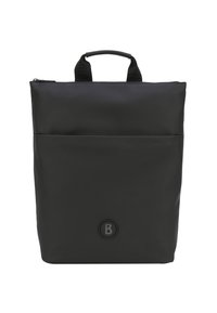 Un sac à dos noir en matériau synthétique lisse, doté d'une poignée supérieure, d'une poche avant et d'un logo circulaire sur le bas de l'avant.