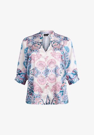 Blusa bianca con motivi floreali paisley blu e rosa, maniche arrotolate e scollo a V diviso.