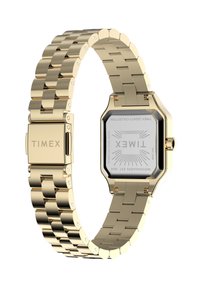 Zelta krāsas nerūsējošā tērauda pulkstenis ar taisnstūrveida ciparnīcu, sietveida aproces dizainu un gravētu logotipu aizmugurē. Aprīkots ar stikla pārklājumu.