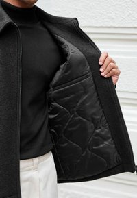 Next Könnyű dzseki - black zip