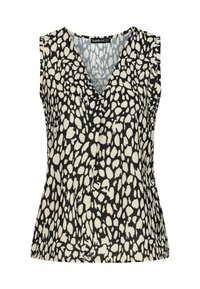 Haut sans manches en V, avec un motif à pois irréguliers noir et blanc, taille légèrement ajustée et tissu léger.