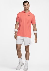 Nike Performance SOLID - Polotričko - light wild mango black