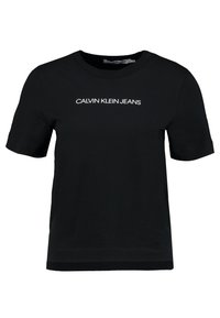 Czarny krótki t-shirt z okrągłym dekoltem z napisem "CALVIN KLEIN JEANS" wydrukowanym na białym tle na piersi.