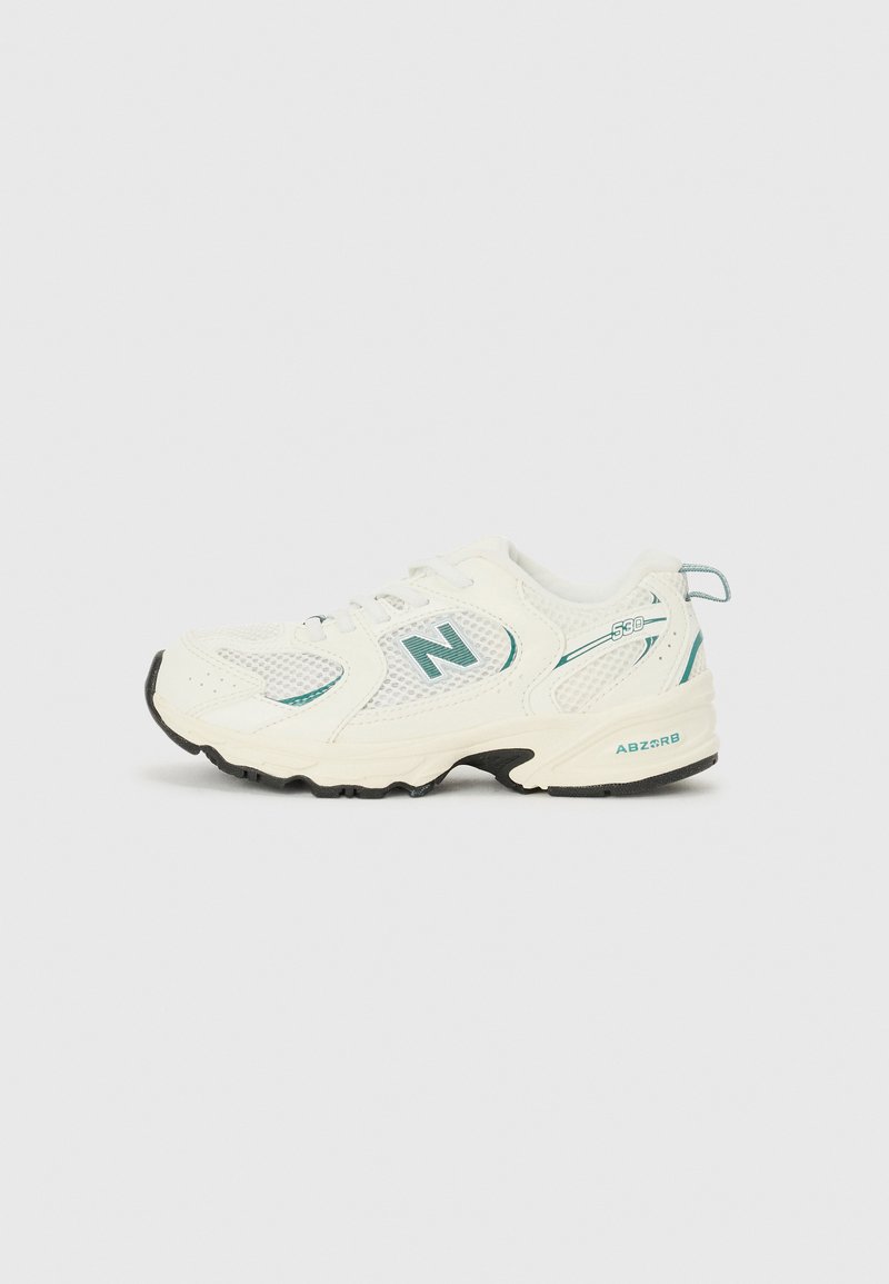 White athletic shoe with mesh and synthetic material, featuring a black sole, teal accents, and a prominent "N" logo on the side.