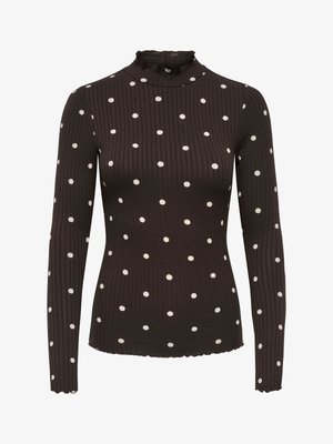 Langærmet ribbet rullekravetrøje i mørkebrun med hvide polkaprikker; har en flæsekant ved halsen og en tætsiddende pasform.