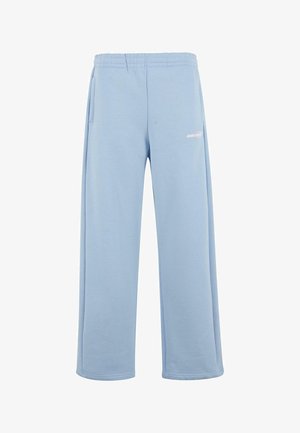 Heledad sinine puuvillasegu, millel on elastne vöökoht, küljetaskud ja valge logo vasakul reiel.