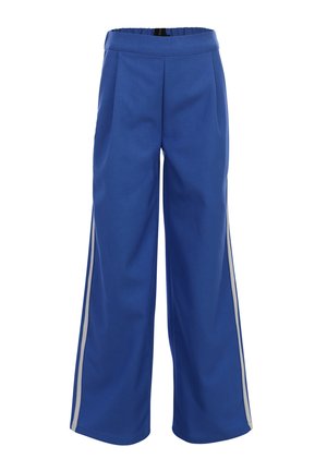 Blauwe broek met wijde pijpen, witte zijstrepen en een elastische tailleband, afgebeeld op een witte achtergrond.