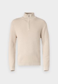 Pull beige en maille avec un col haut et une fermeture à demi-fermeture éclair. Présente un motif texturé et des manches longues. Tissu doux.
