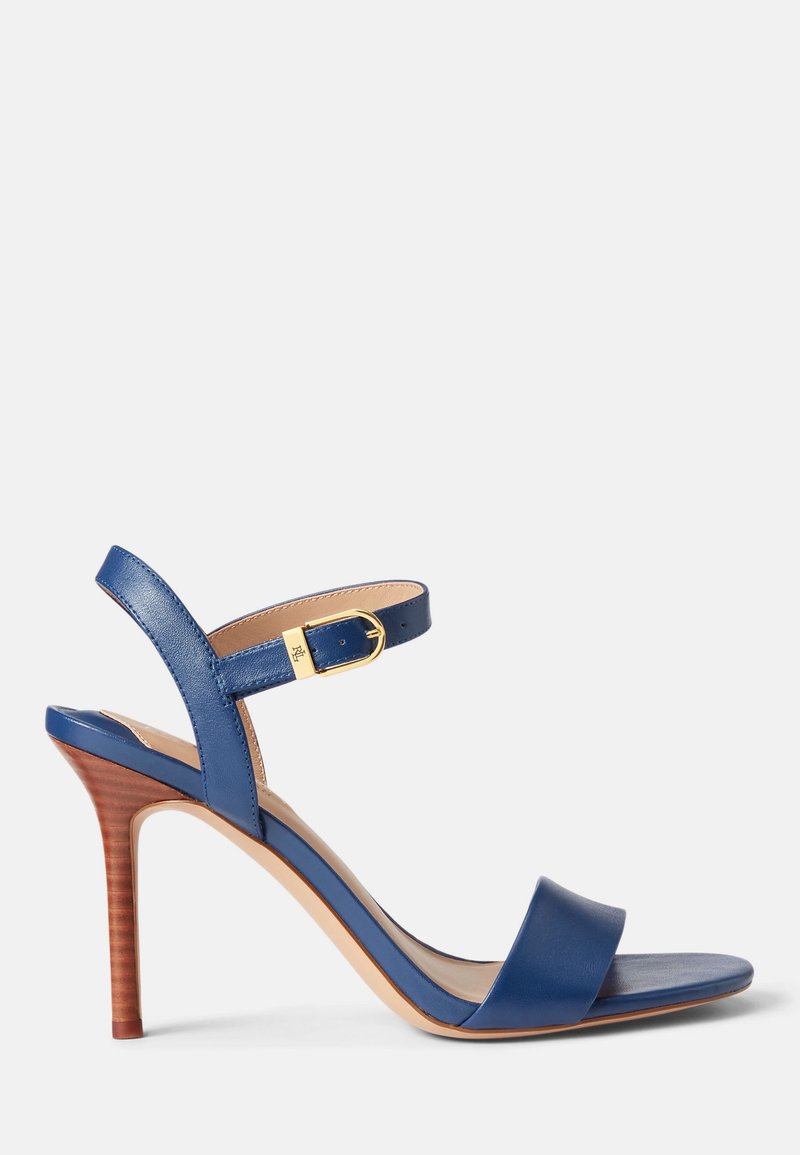 Blue leather high-heeled sandal featuring a wide front strap, adjustable ankle strap with buckle, and a wooden-textured heel.