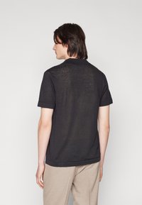 Les Deux EMMANUEL - Polo shirt - black