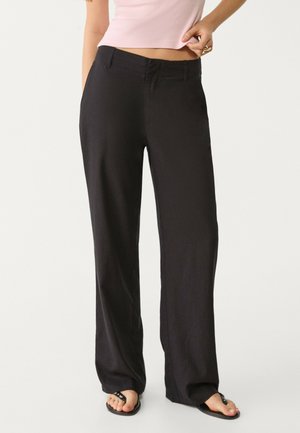 FLOWING STRAIGHT - Trousers - black