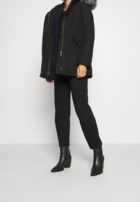 Canadian Classics Down coat - black