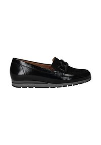 Black patent leather loafers feature a woven chain accent, rounded toe, and a low wedge with a textured outsole.
