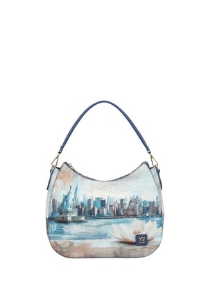 Borsa con manico blu con stampa dello skyline di New York e della Statua della Libertà sull'acqua con fiore di loto bianco.