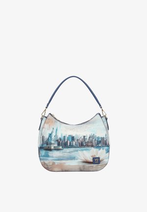 Borsa con manico blu con stampa dello skyline di New York e della Statua della Libertà sull'acqua con fiore di loto bianco.
