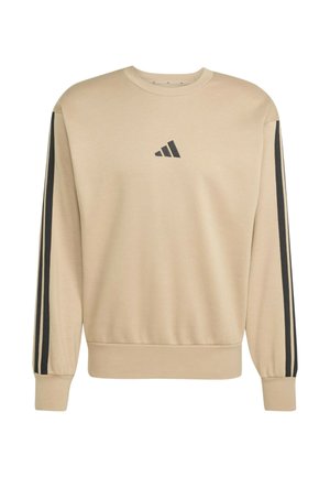 Felpa beige a maniche lunghe con logo Adidas nero al centro del petto e strisce nere che scorrono lungo entrambe le maniche.