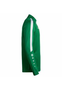 Groene sportshirt met lange mouwen, witte streepdetails, een ritskraag en knoopaccenten op de mouwen. Gemaakt van ademend materiaal.