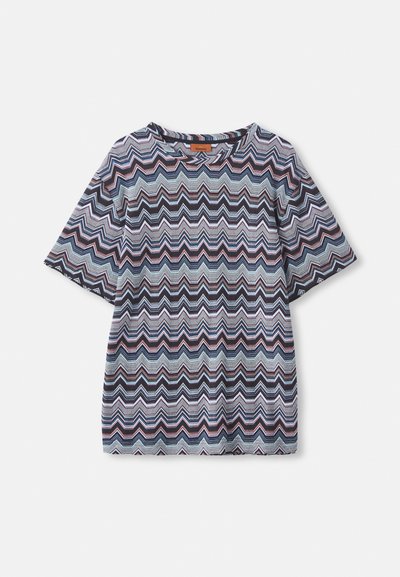 Short-sleeve shirt with multicolored zigzag pattern in shades of blue, black, pink, and white, laid flat on white background.