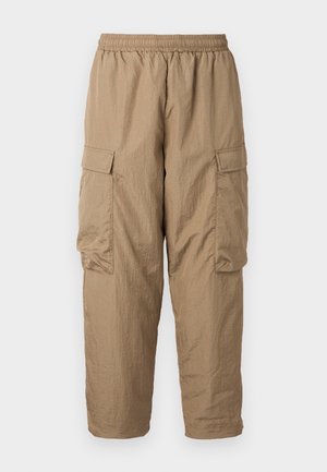 Khaki cargo pants with an elastic waistband, two side cargo pockets, lightweight, textured fabric, and a relaxed fit with tapered ankles.