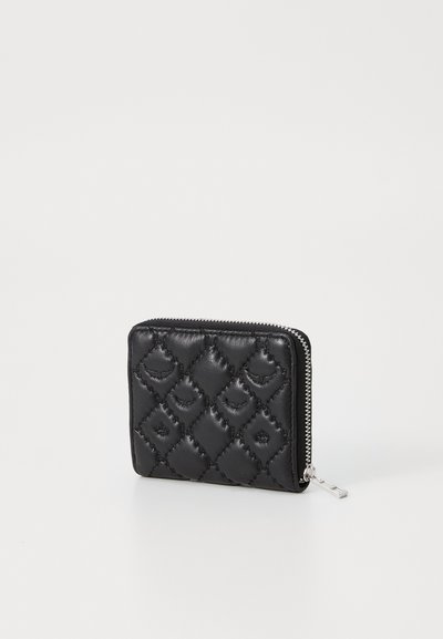 Black leather wallet with quilted pattern, zip closure, and silver hardware accents. Compact rectangular shape, sleek texture.