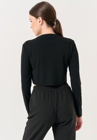 Jimmy Key CREW NECK LONG SLEEVED CROP - Camicetta - black