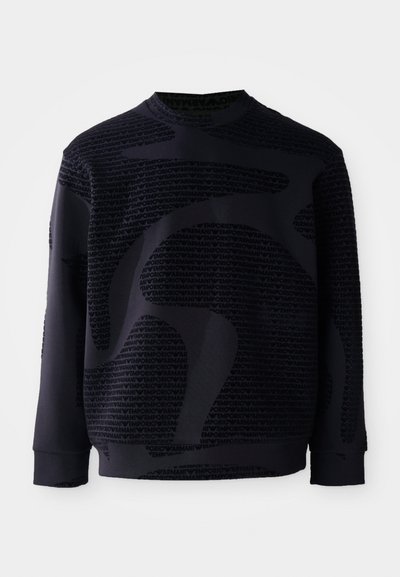 Black sweatshirt with textured fabric, featuring a prominent tonal pattern and round neck; long sleeves with ribbed cuffs and hem.