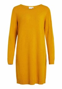 Gul stickad klänning med långa ärmar, rund halsringning och ribbade muddar. Tyget har en mjuk struktur och faller till mitten av låret.