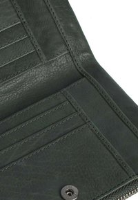 Dark green leather wallet with multiple card slots, visible stitching, and a metal snap closure. Textured surface with smooth accents.