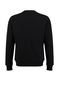 Felpa nera con un motivo a maglia waffle testurizzato, collo rotondo e maniche lunghe. Presenta una sottile tasca laterale sulla manica sinistra.