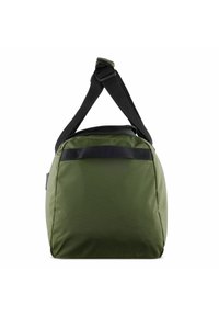 Green fabric bag with a textured surface, featuring a black strap and top handle. The rectangular shape has a grid pattern on the front.